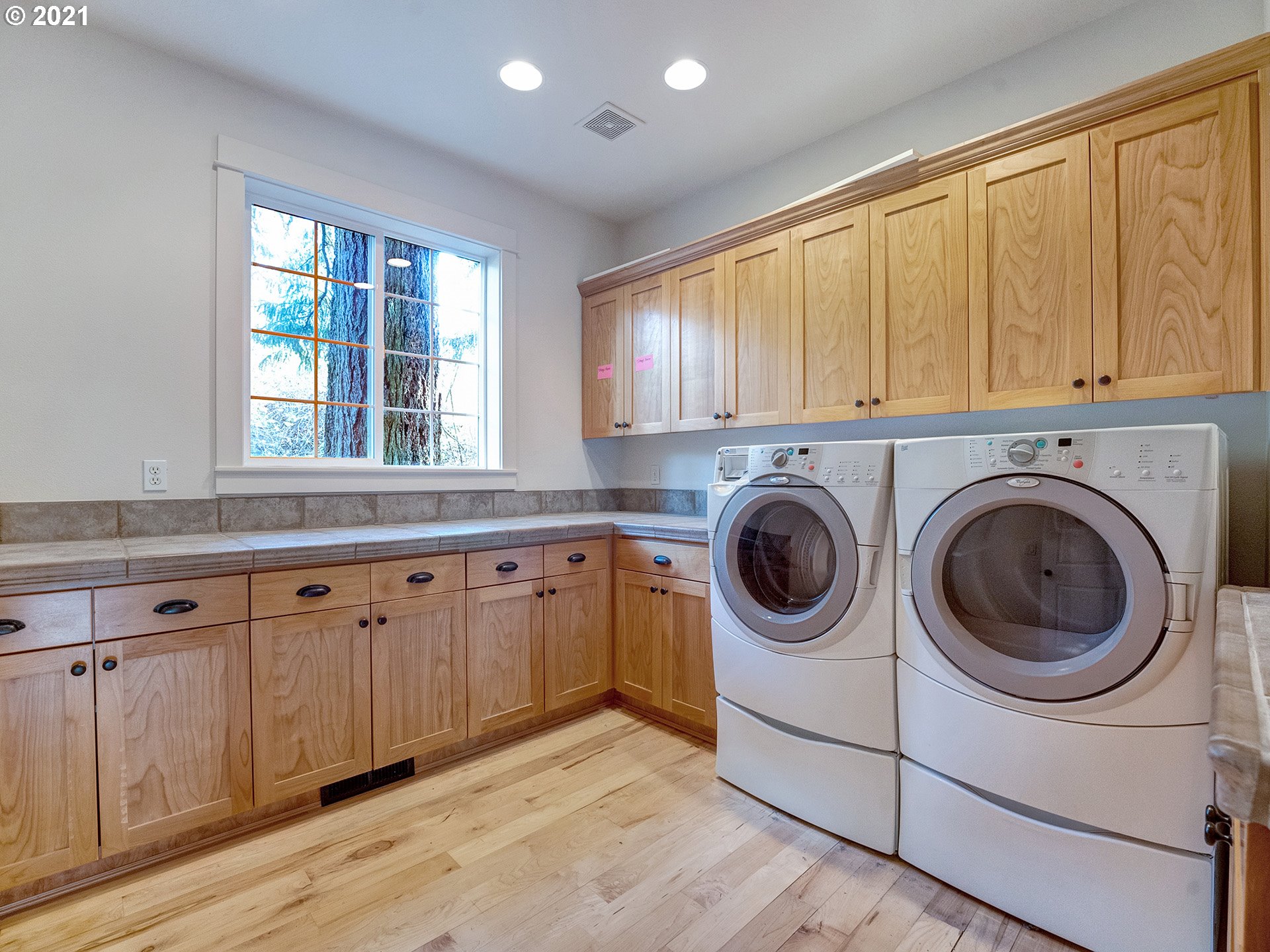 10248 Southeast Nicole Loop Happy Valley, OR 97086 - Photo 27 of 32 a utility room with sink dryer and washer