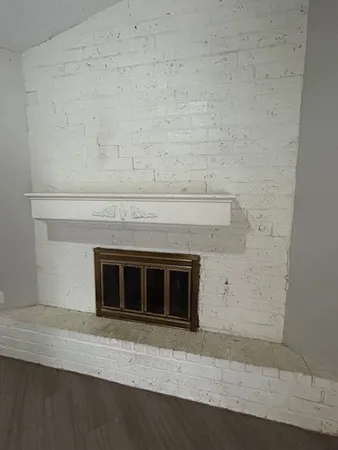 a living room with a fireplace