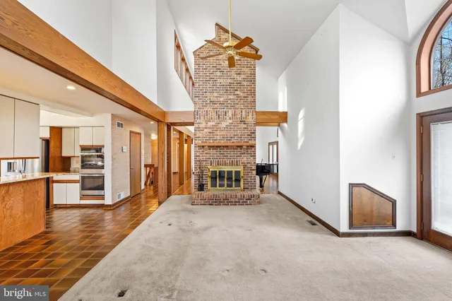 a kitchen with stainless steel appliances granite countertop a stove and a sink