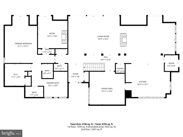 a view of livingroom with furniture wooden floor and windows