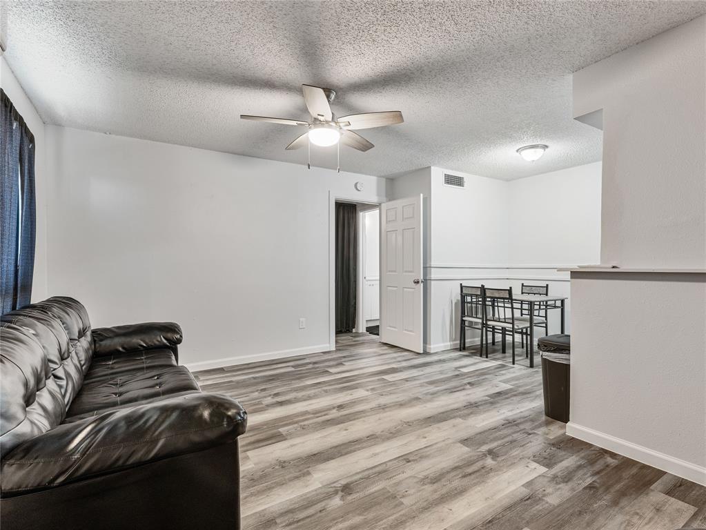 9464 Highway 180, Unit 1 Breckenridge, TX 76424 - Photo 3 of 11 a view of a livingroom with a fireplace
