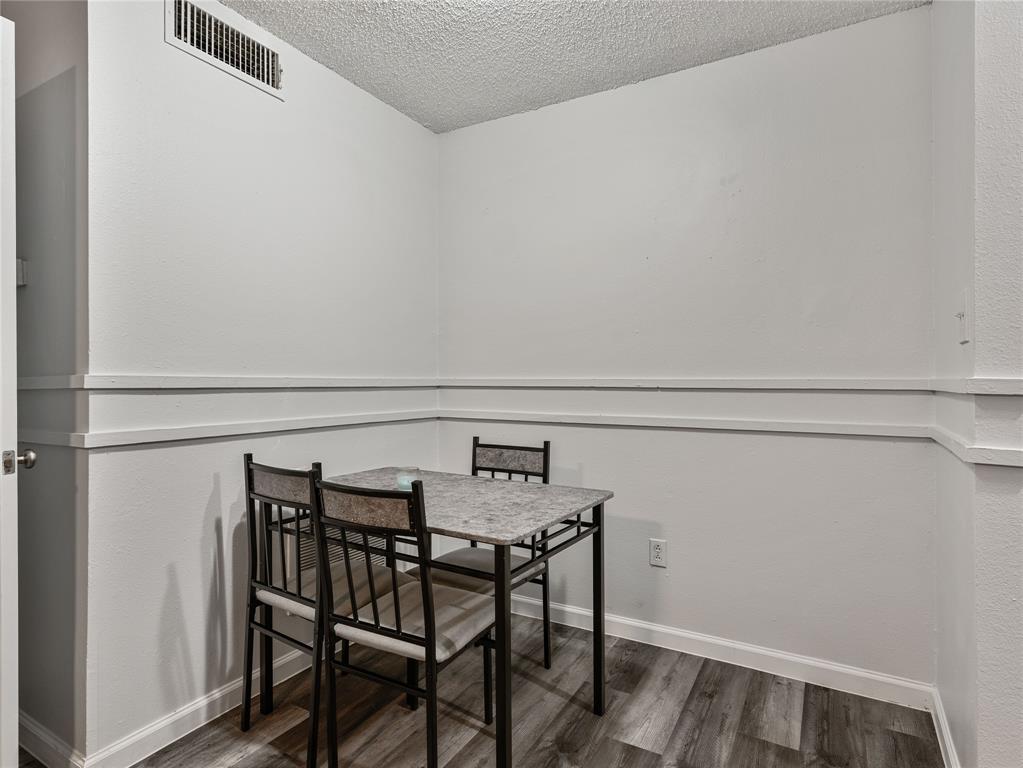 9464 Highway 180, Unit 1 Breckenridge, TX 76424 - Photo 6 of 11 a view of a table and chairs in the room