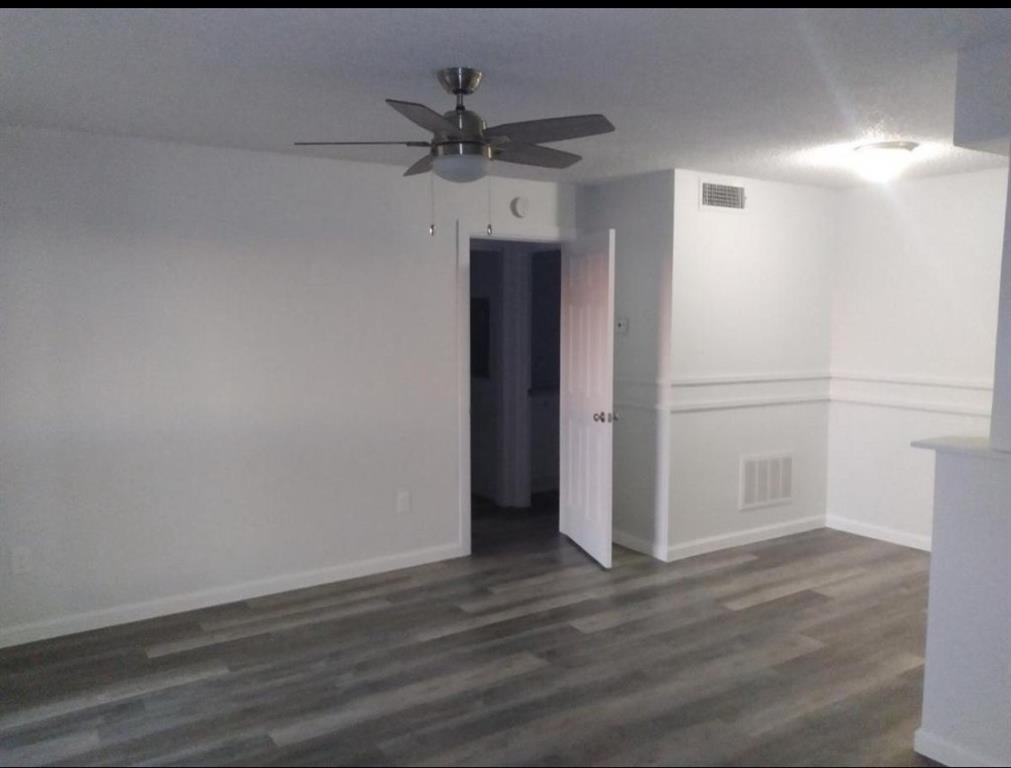 9464 Highway 180, Unit 1 Breckenridge, TX 76424 - Photo 8 of 11 a view of a livingroom with wooden floor