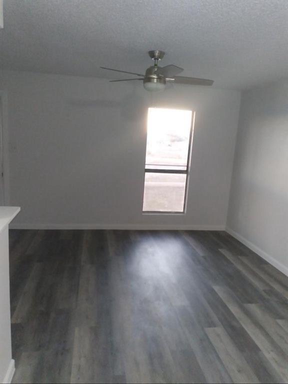 9464 Highway 180, Unit 1 Breckenridge, TX 76424 - Photo 9 of 11 an empty room with a window