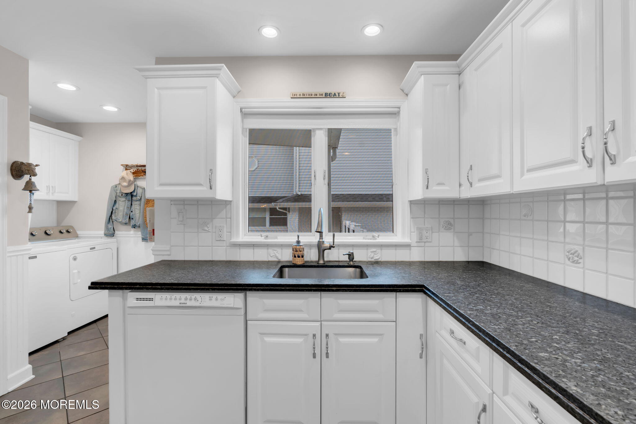 29 Green Island Road Toms River, NJ 08753 - Photo 19 of 63 a kitchen with granite countertop a sink and white cabinets