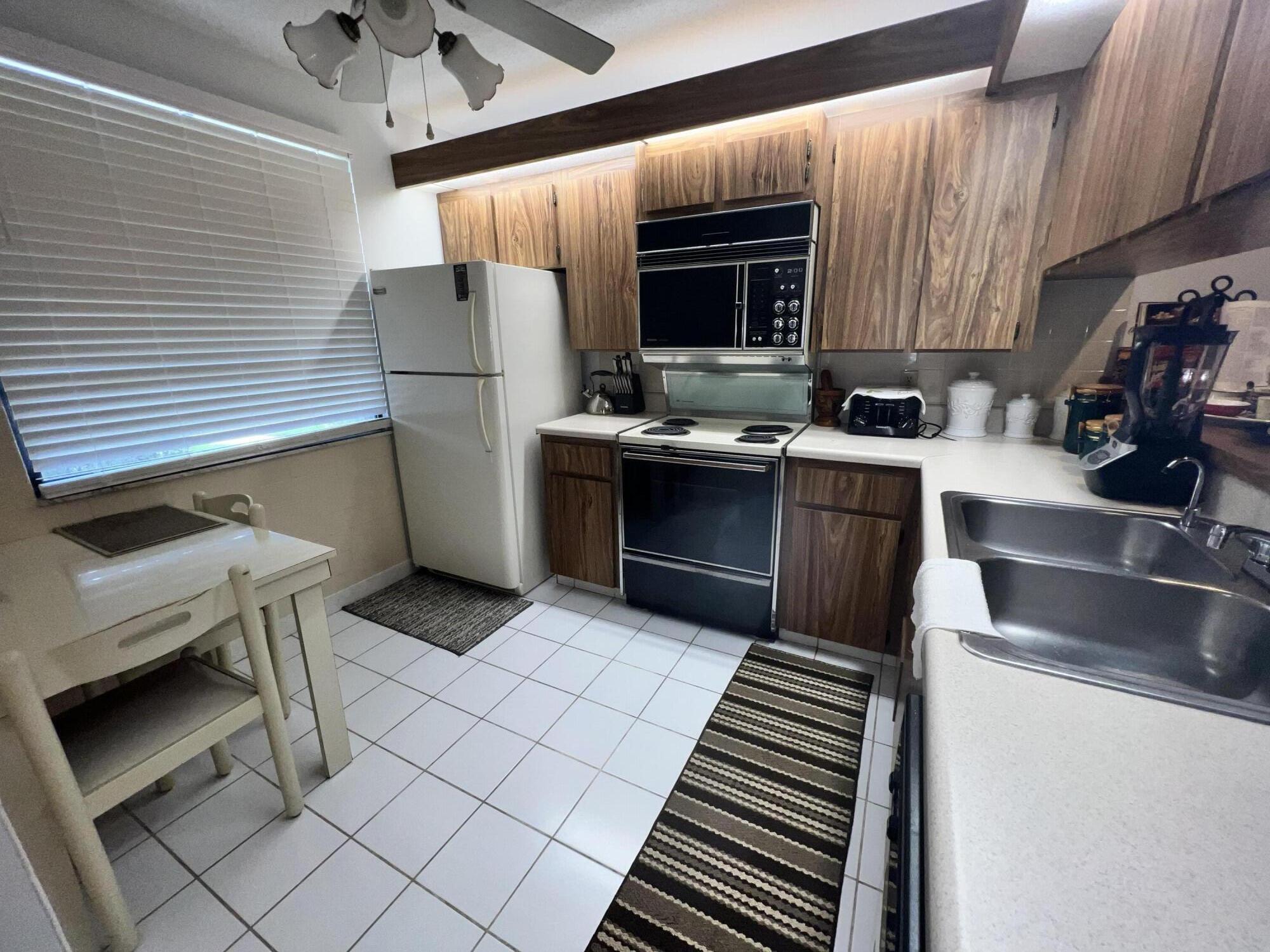 6121 Balboa Circle, Unit 106 Boca Raton, FL 33433 - Photo 7 of 15 IMG_1586