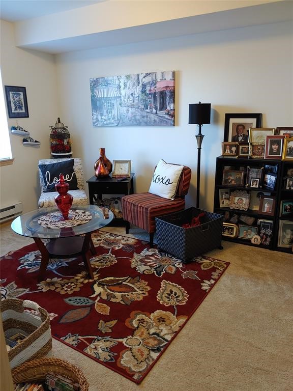 26404 104th Avenue Southeast, Unit 29 Kent, WA 98030 - Photo 12 of 13 a living room with furniture and a rug