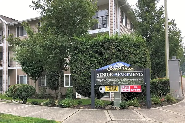 a sign that is on the side of a road