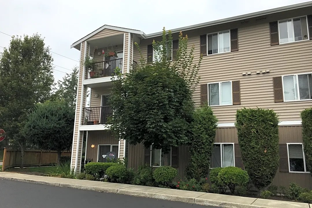 26404 104th Avenue Southeast, Unit 29 Kent, WA 98030 - Photo 5 of 13 a front view of a house with plants and trees