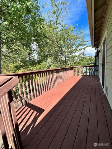 a view of balcony with wooden floor