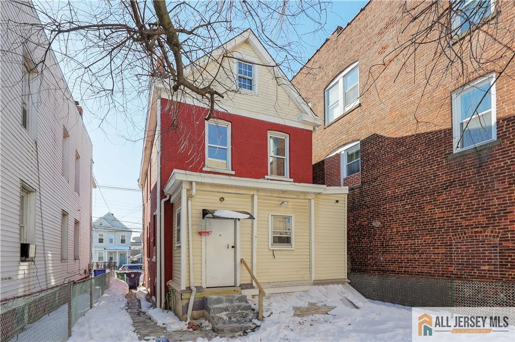 344 Market Street Perth Amboy, NJ 08861 - Photo 30 of 31 a front view of a building with large tree