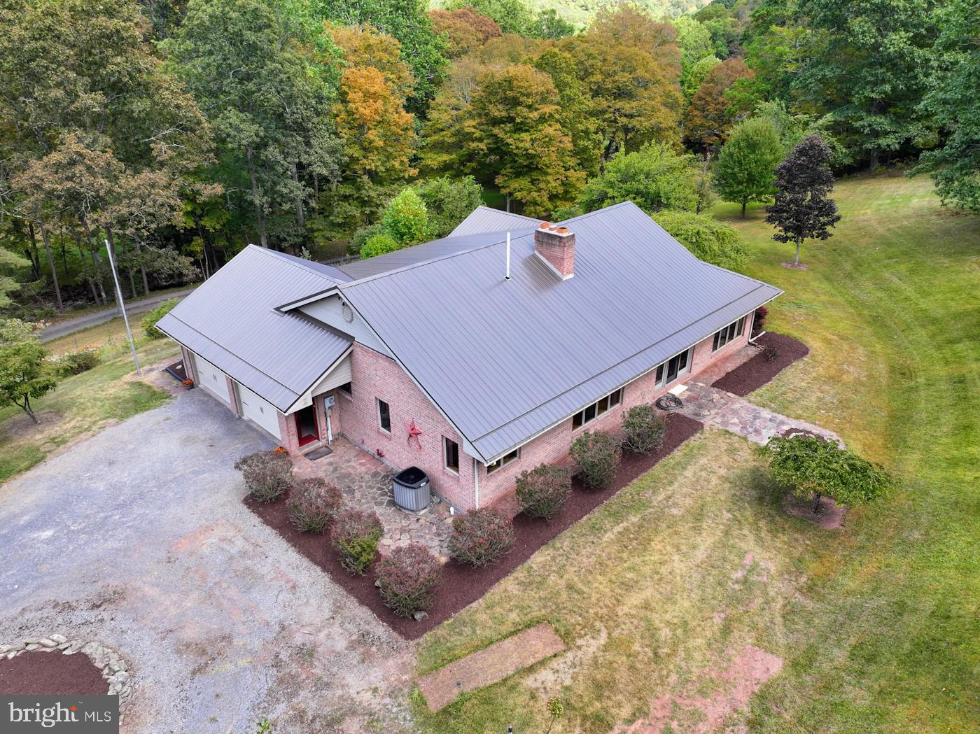 353 Pine Pitch Road Buffalo Mills, PA 15534 - Photo 11 of 83 an aerial view of a house with a yard