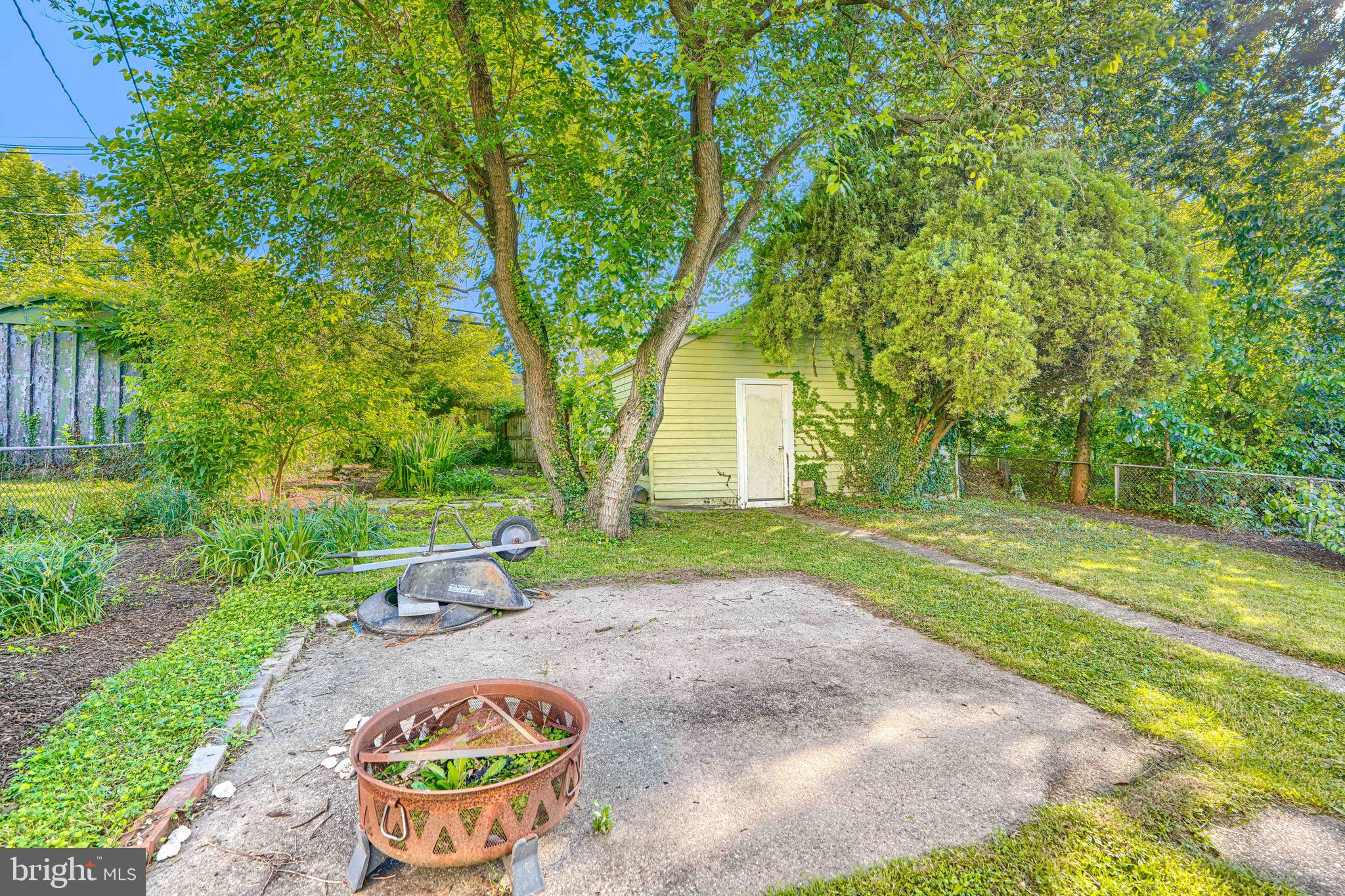 2705 Latona Road Baltimore, MD 21214 - Photo 46 of 53 a view of a backyard with a garden and entertaining space