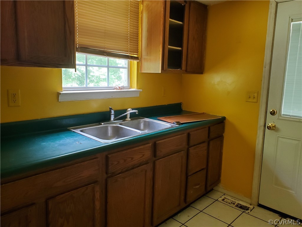 4094 Cedar Plains Road Sandy Hook, VA 23153 - Photo 7 of 9 a bathroom with a sink a mirror and a window