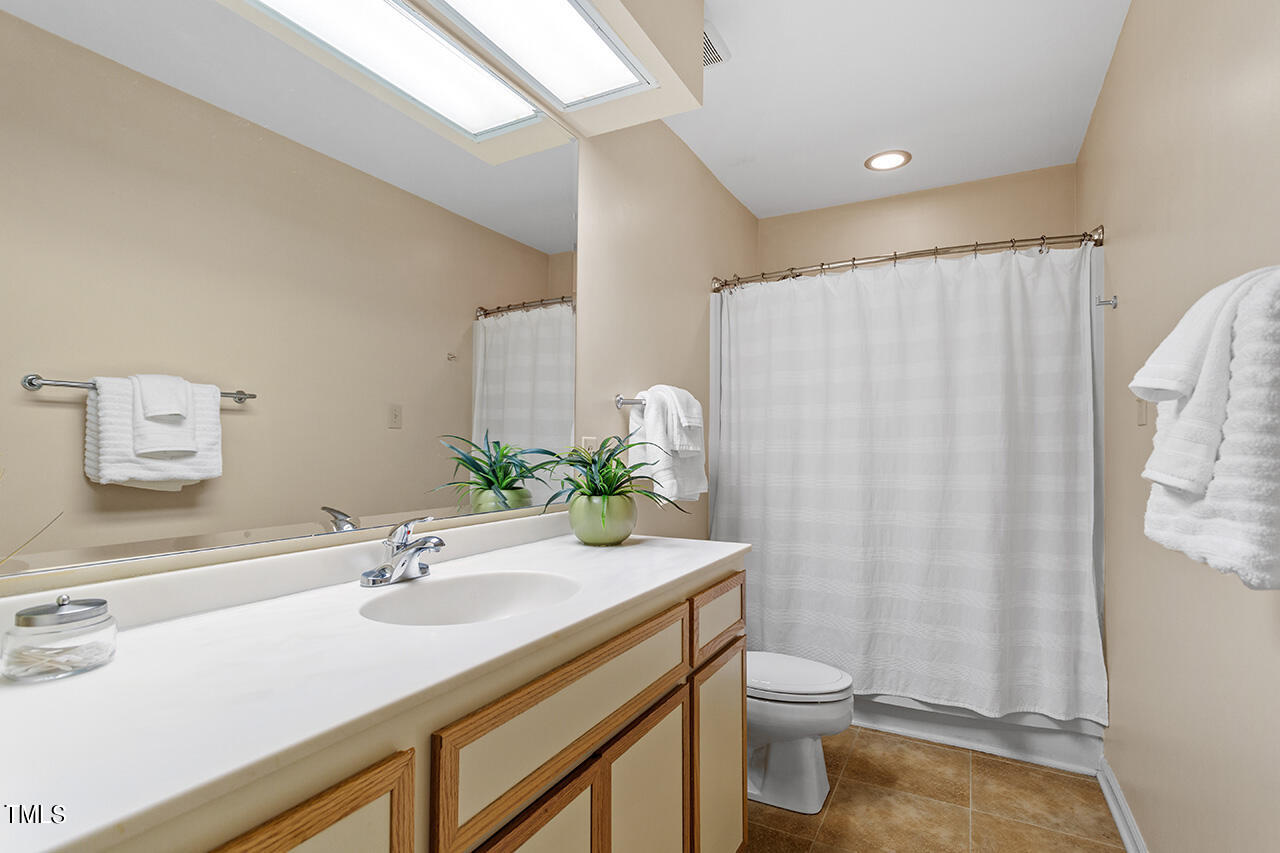 3021 Rue Sans Famille Raleigh, NC 27607 - Photo 28 of 33 Downstairs full bath