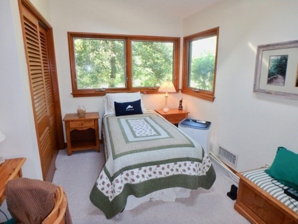 29 Naushon Road West Tisbury, MA 02568 - Photo 16 of 26 a living room with furniture and a window