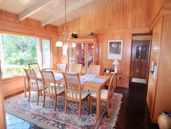 29 Naushon Road West Tisbury, MA 02568 - Photo 6 of 26 a view of a dining room with furniture window and outside view