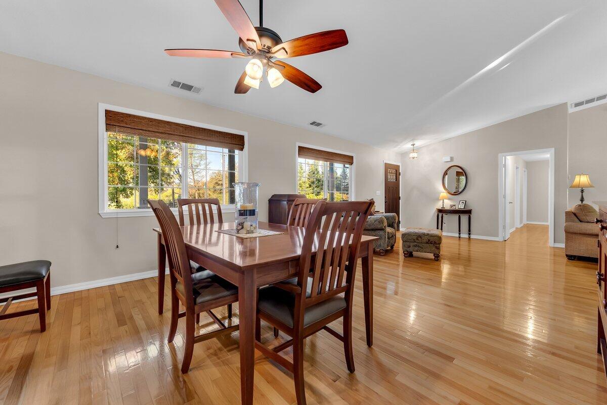 12269 Dry Creek Road Bella Vista, CA 96008 - Photo 19 of 74 a view of a dining room with furniture window and wooden floor