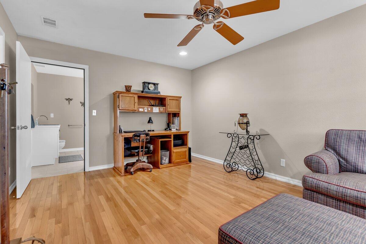 12269 Dry Creek Road Bella Vista, CA 96008 - Photo 31 of 74 a view of a livingroom with furniture and a workspace