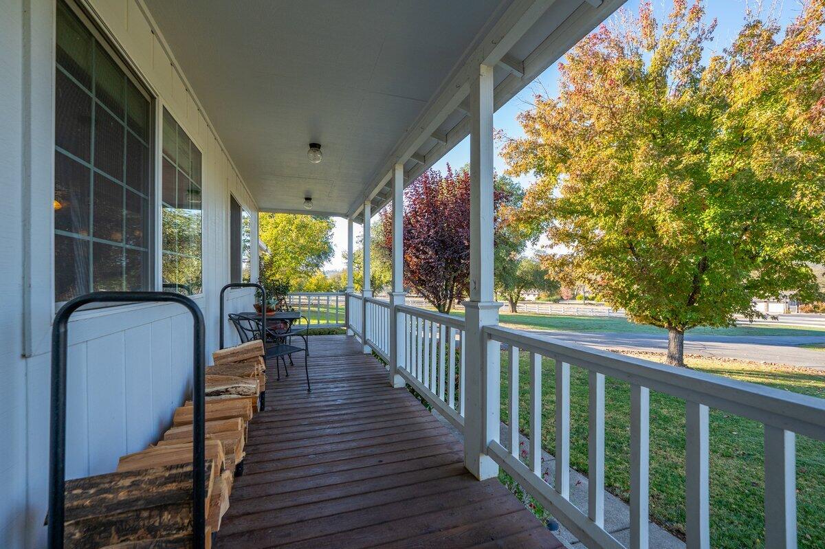 12269 Dry Creek Road Bella Vista, CA 96008 - Photo 5 of 74 a view of a porch with wooden floor and outdoor space