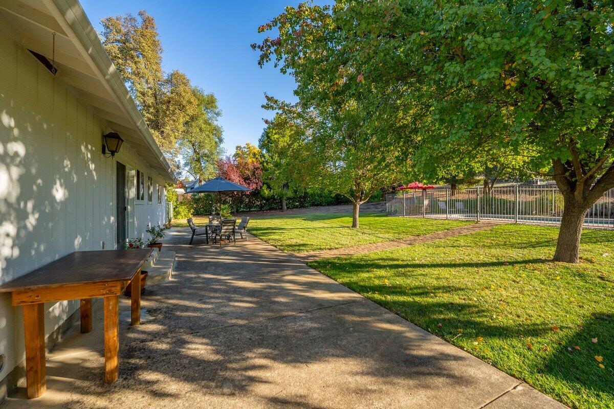 12269 Dry Creek Road Bella Vista, CA 96008 - Photo 60 of 74 a view of a swimming pool with an outdoor space