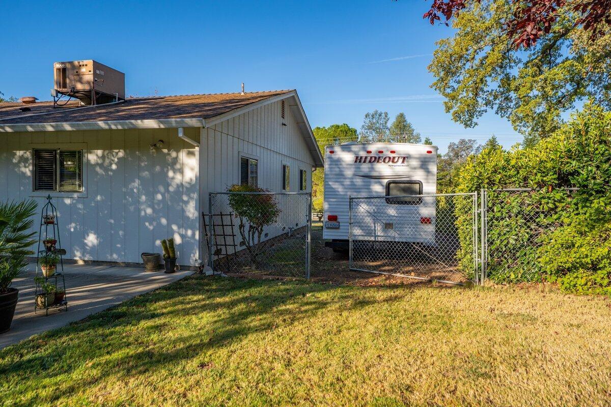 12269 Dry Creek Road Bella Vista, CA 96008 - Photo 70 of 74 a front view of house with a yard