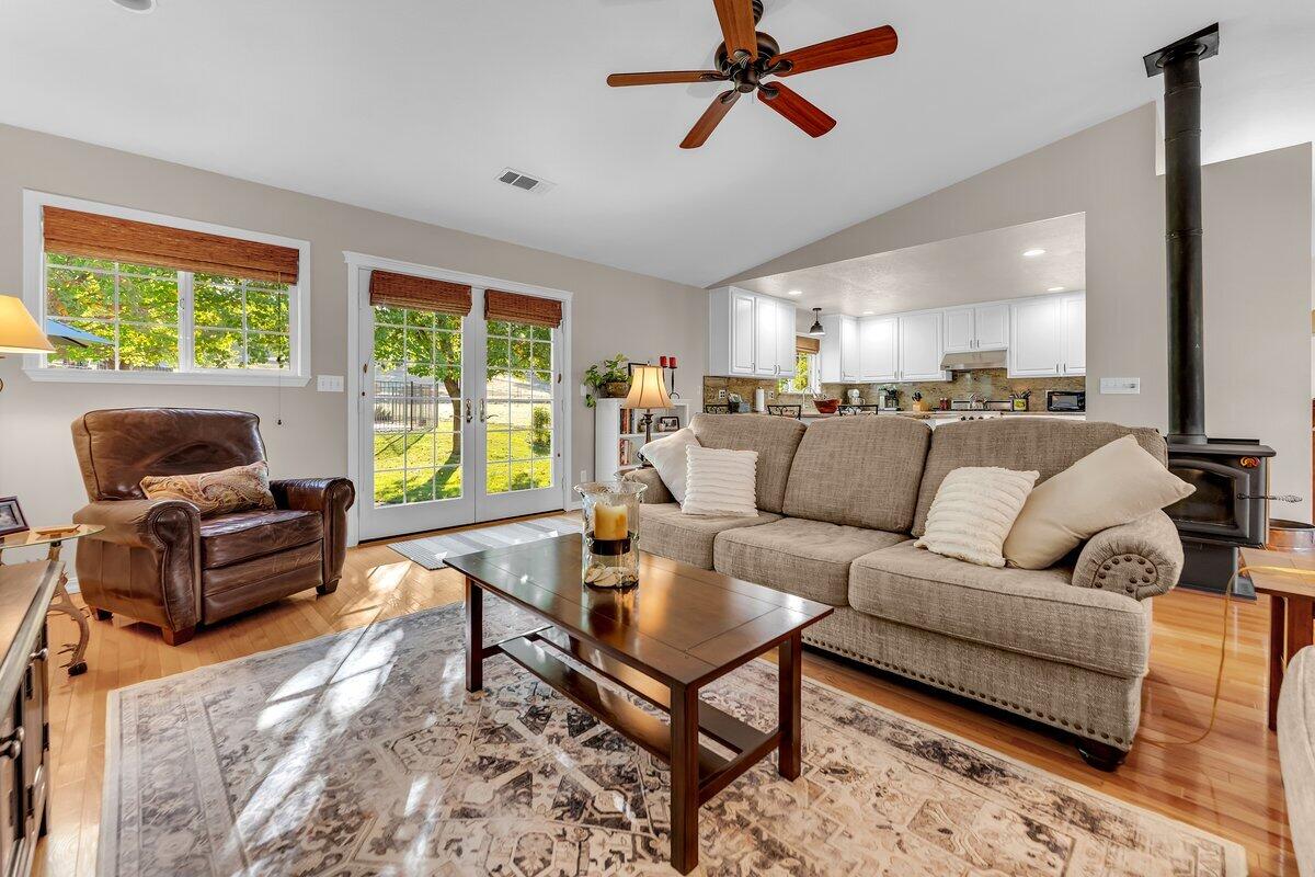 12269 Dry Creek Road Bella Vista, CA 96008 - Photo 7 of 74 a living room with furniture and a window