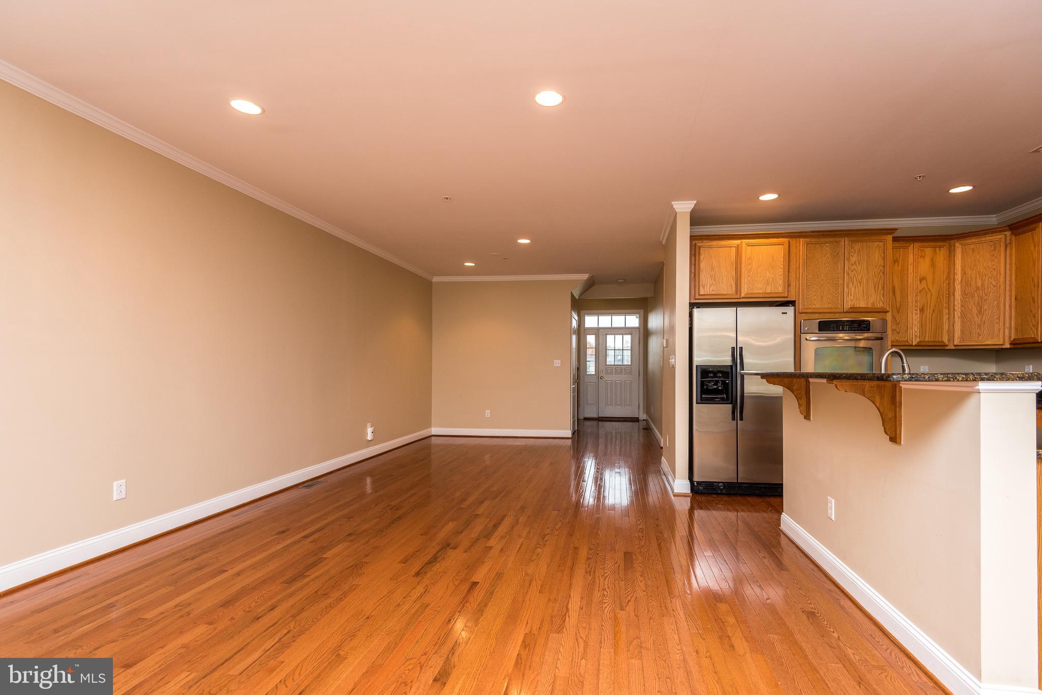 3233 Meadow View Circle, Unit 155 Furlong, PA 18925 - Photo 11 of 36 a view of a kitchen with wooden floor and a window
