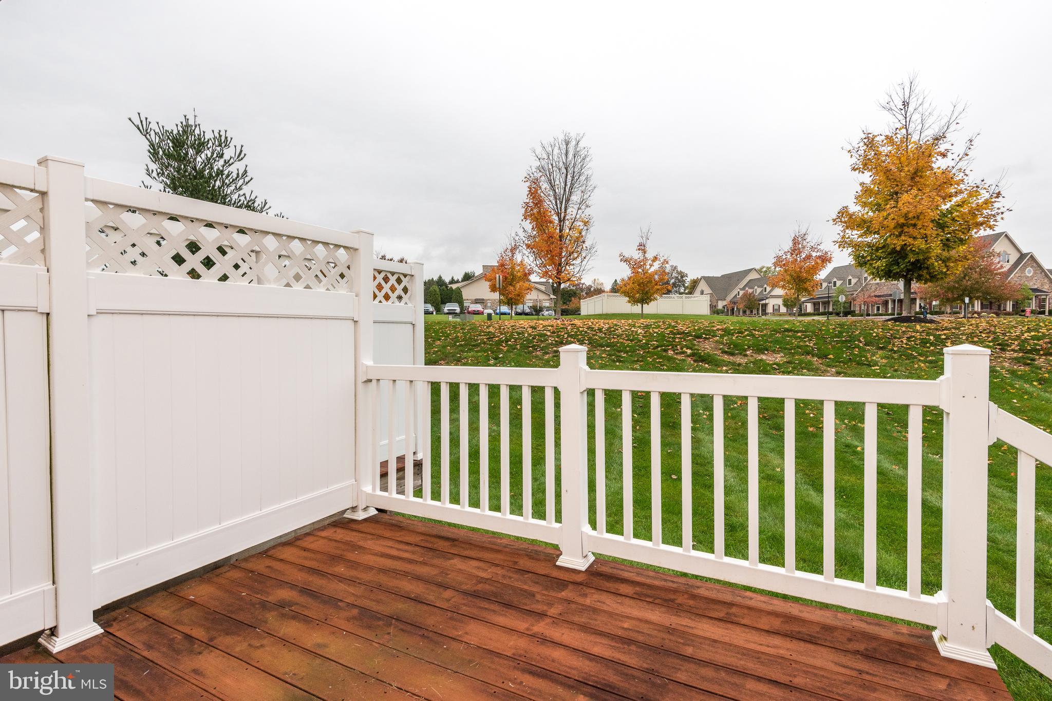 3233 Meadow View Circle, Unit 155 Furlong, PA 18925 - Photo 15 of 36 a view of a balcony with wooden floor
