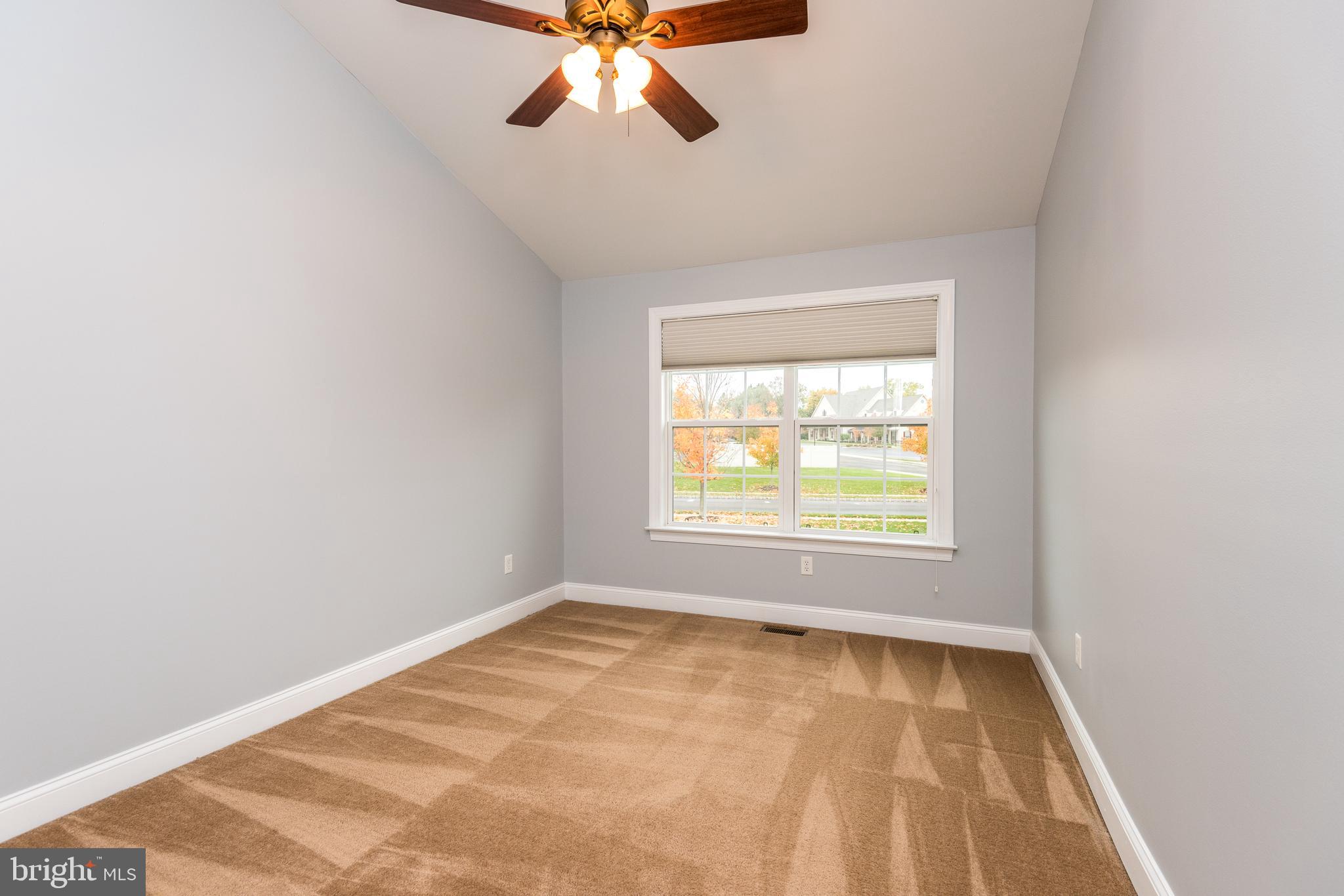 3233 Meadow View Circle, Unit 155 Furlong, PA 18925 - Photo 23 of 36 an empty room with a window