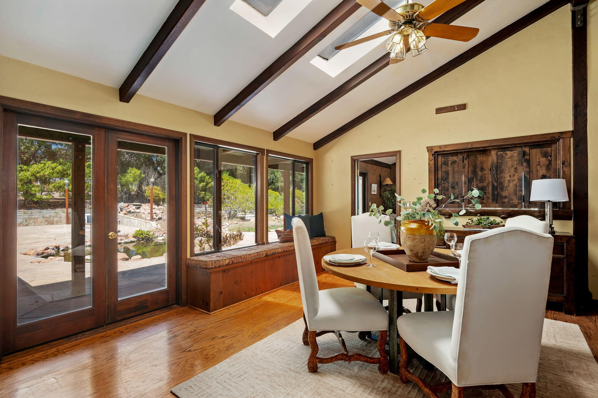 3520 La Entrada Santa Barbara, CA 93105 - Photo 7 of 12 a dining room with furniture a rug and a large window