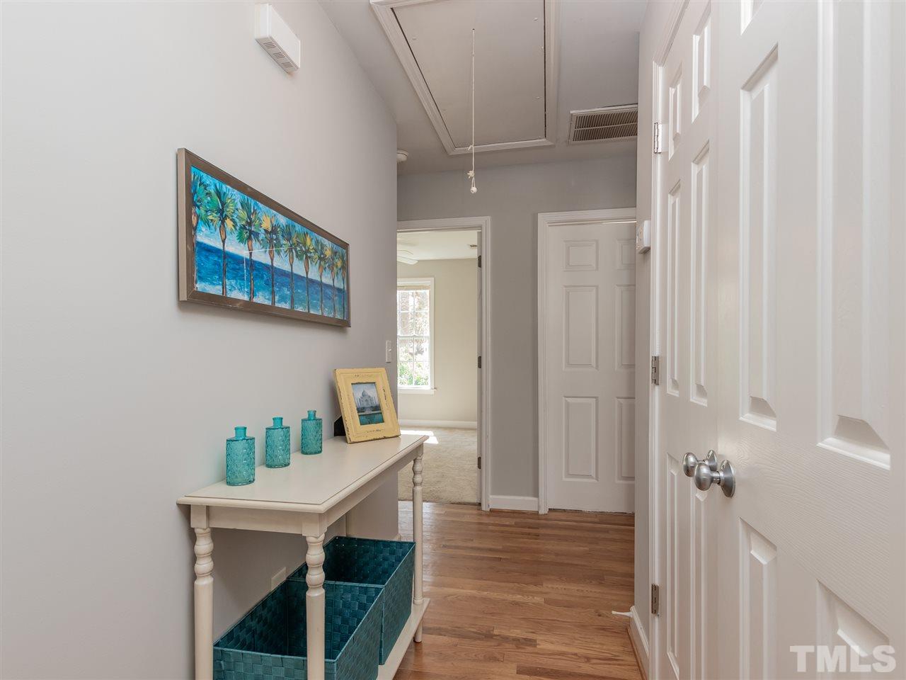 400 Colleton Road Raleigh, NC 27610 - Photo 14 of 23 A view from the living area to the other bedrooms and bonus room