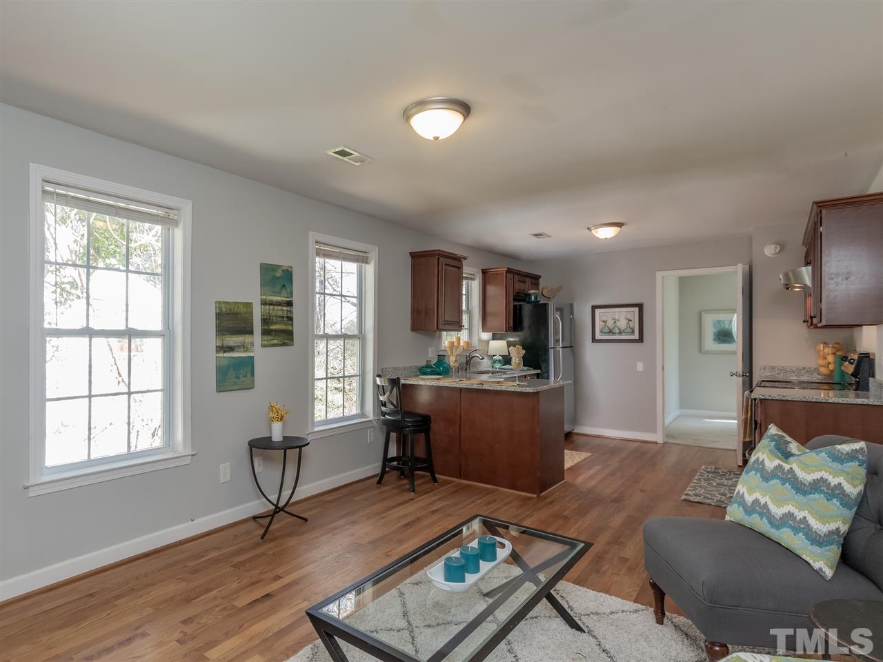 400 Colleton Road Raleigh, NC 27610 - Photo 5 of 23 Open concept living area spills into the kitchen