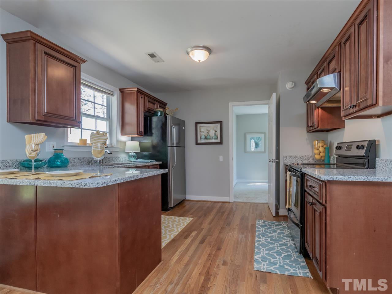 400 Colleton Road Raleigh, NC 27610 - Photo 7 of 23 New granite with updated cabinets