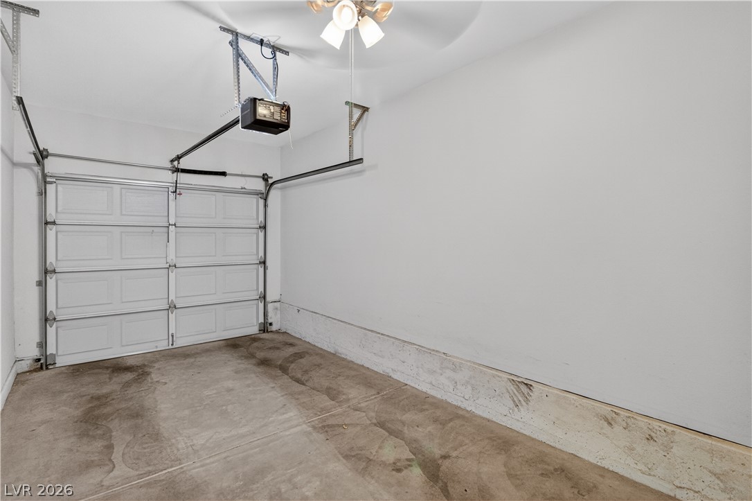 3376 Partridge Run Street Laughlin, NV 89029 - Photo 44 of 92 Functional garage with concrete flooring and convenient automatic door opener.