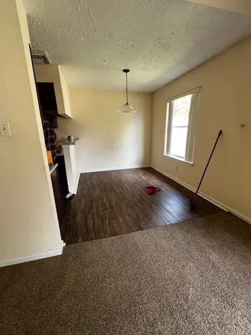 a living room with a fireplace