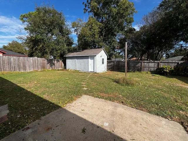 a view of a backyard with a house