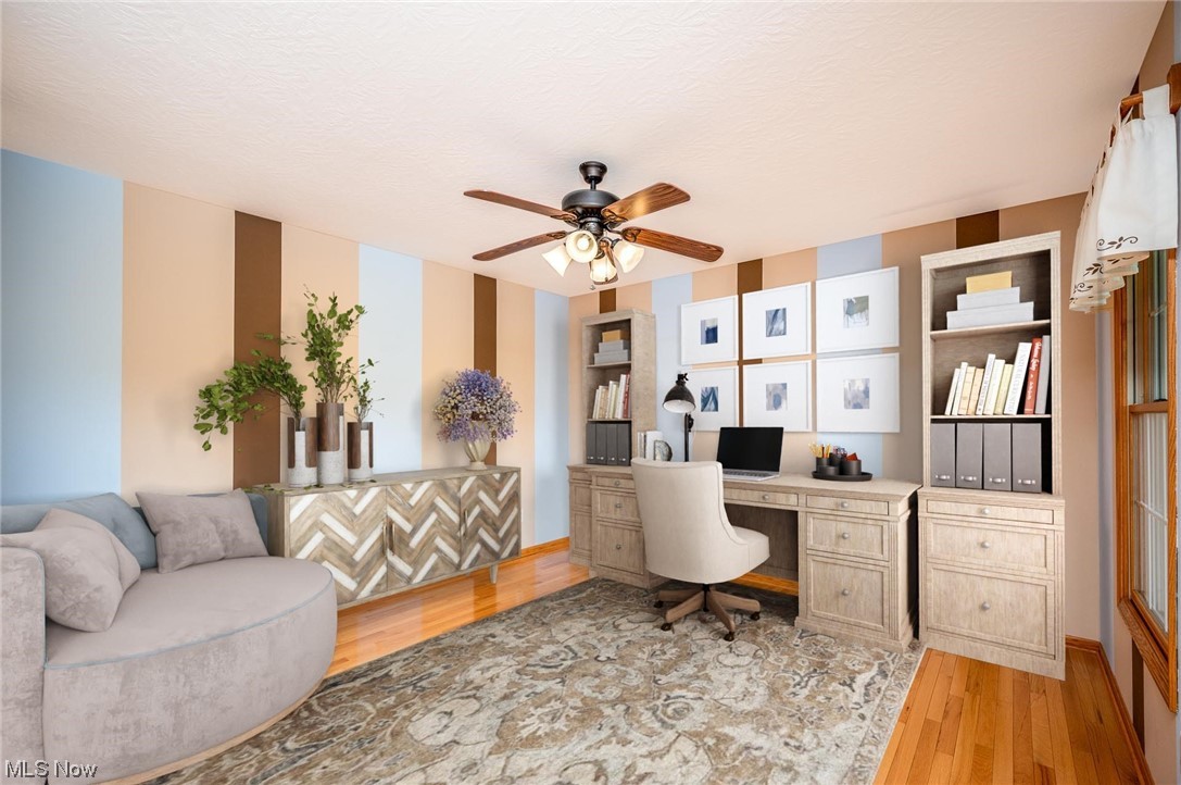 2449 Hartville Road Mogadore, OH 44260 - Photo 22 of 35 Great Room virtually staged as an office area
