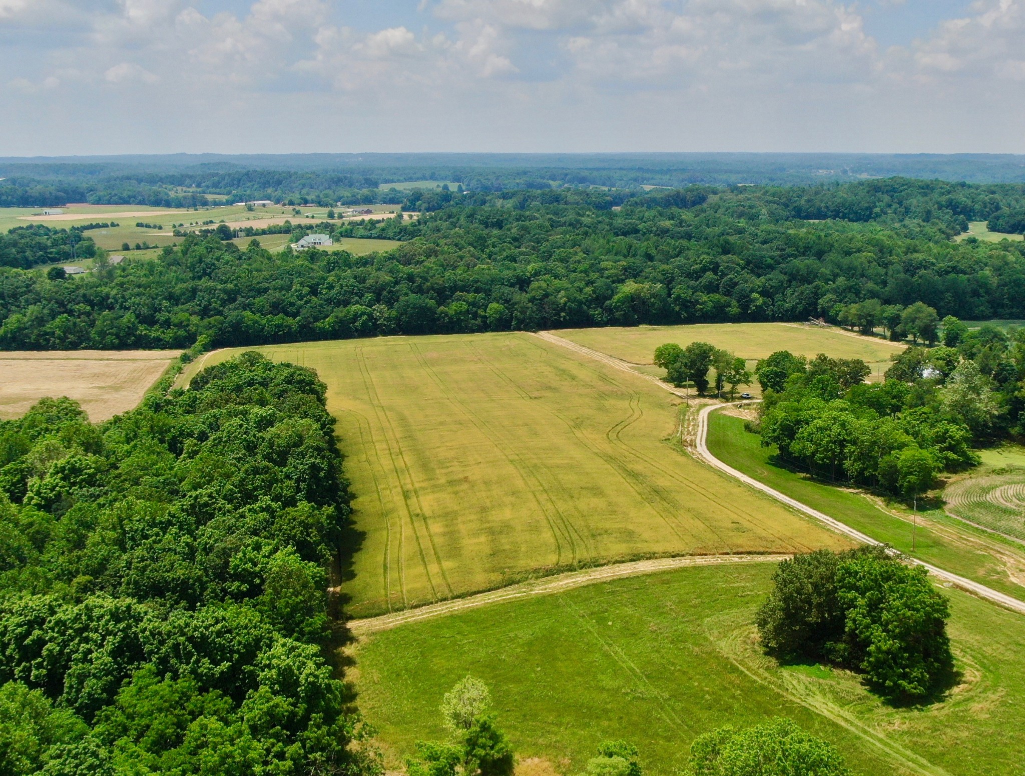 191 B Doug Williams Road Portland, TN 37148 - Photo 1 of 10 an aerial view of a residential houses with outdoor space and trees all around