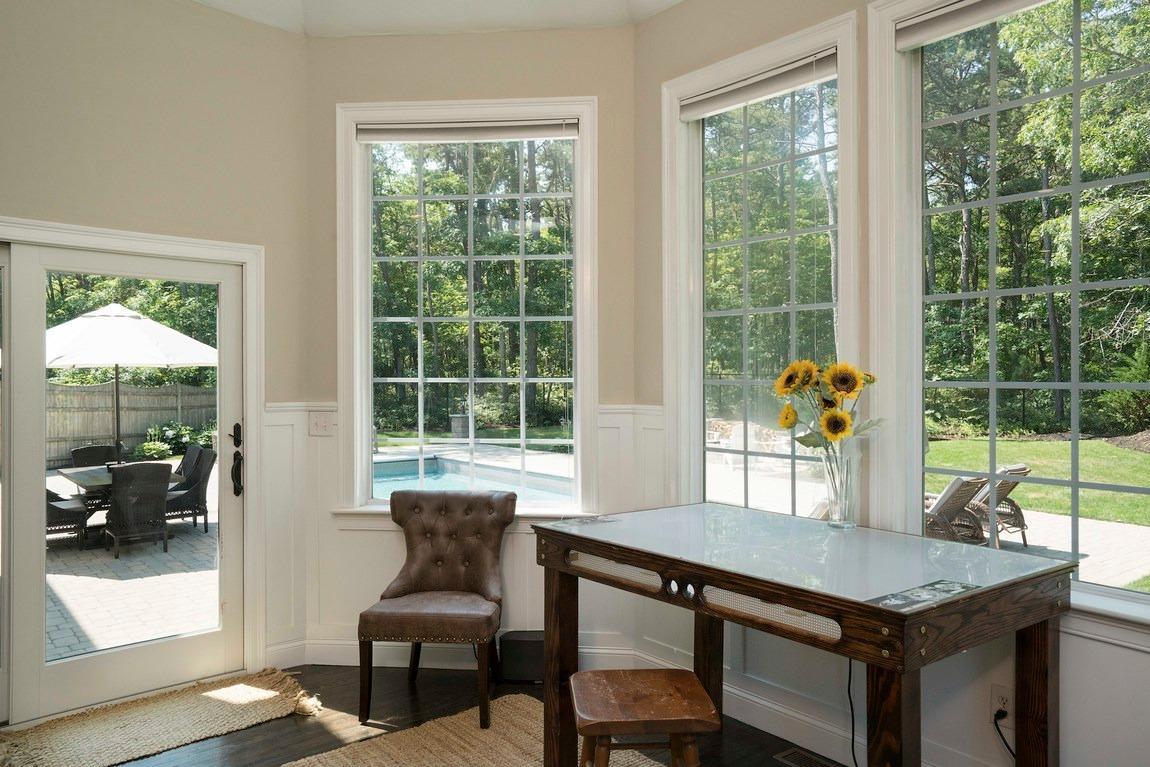 89 Old Hyannis Road Yarmouth Port, MA 02675 - Photo 11 of 35 a view of a livingroom with furniture and a window
