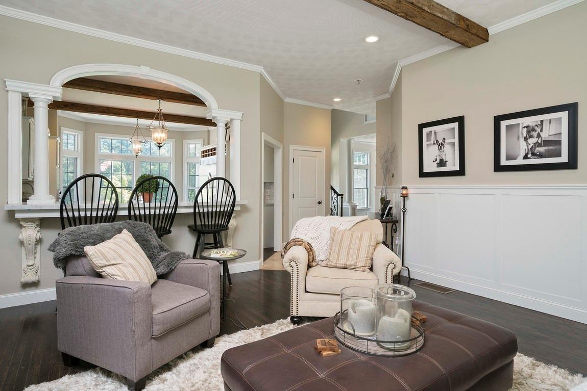 89 Old Hyannis Road Yarmouth Port, MA 02675 - Photo 12 of 35 a living room with furniture a table and a potted plant
