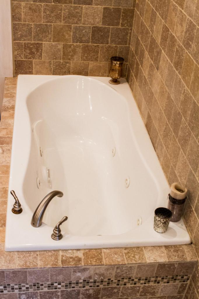 89 Old Hyannis Road Yarmouth Port, MA 02675 - Photo 18 of 35 a bathroom with a bathtub