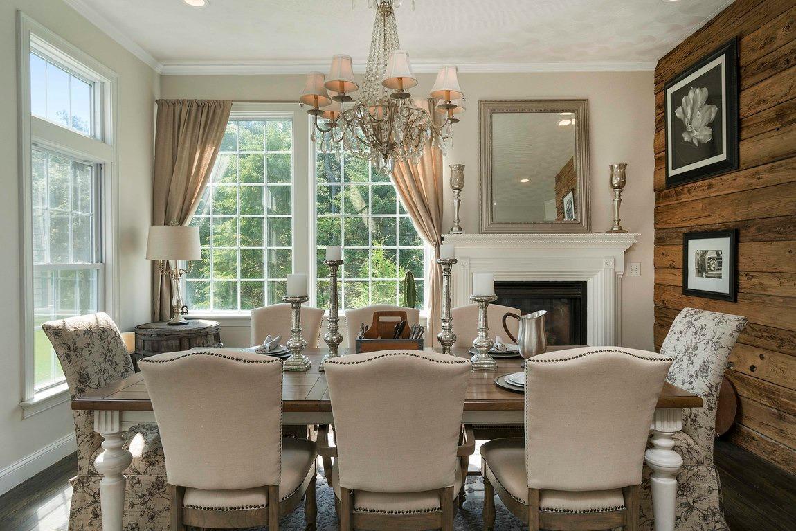 89 Old Hyannis Road Yarmouth Port, MA 02675 - Photo 19 of 35 a dining room with furniture a livingroom and chandelier