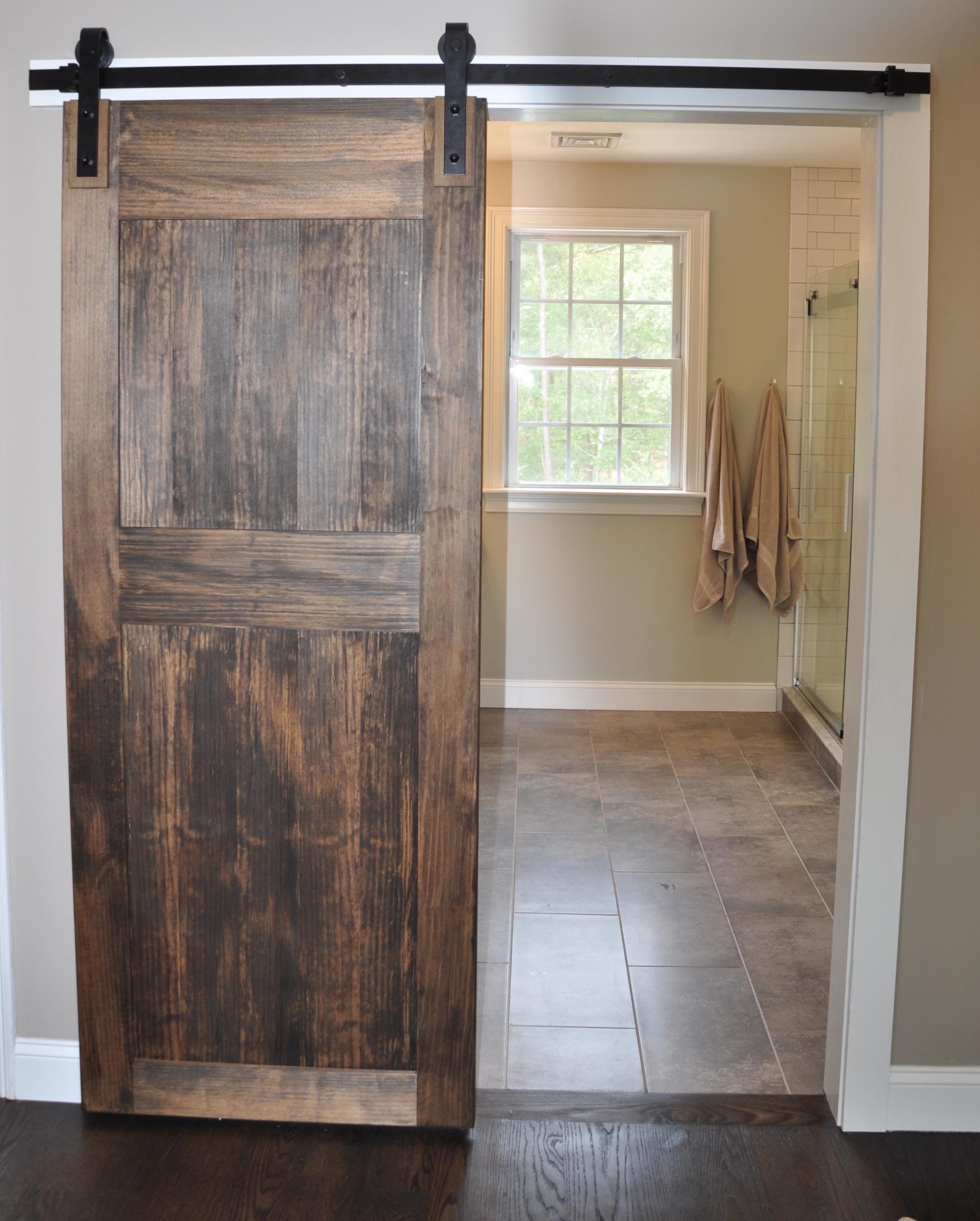 89 Old Hyannis Road Yarmouth Port, MA 02675 - Photo 24 of 35 a bathroom with a glass shower door