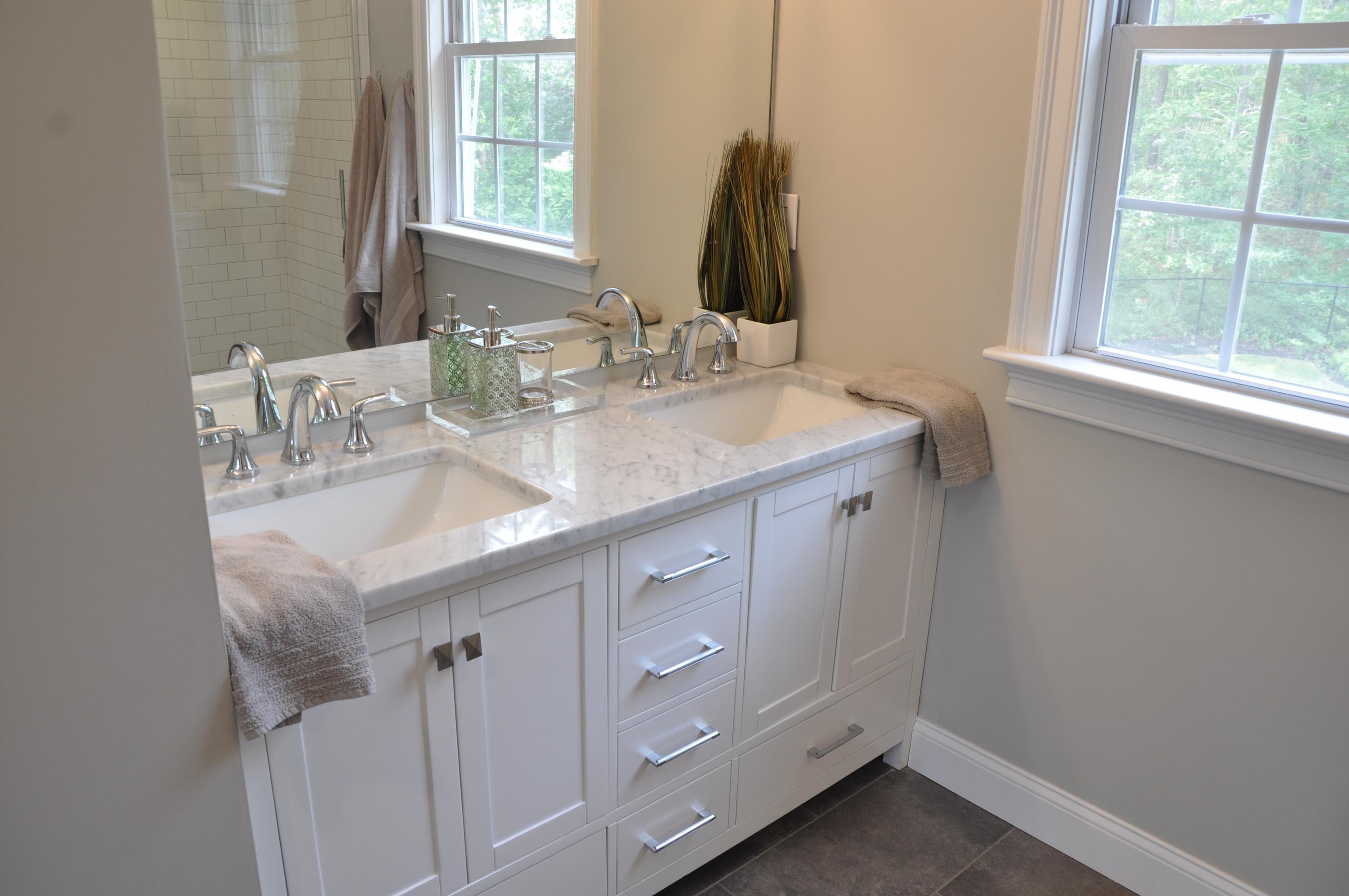 89 Old Hyannis Road Yarmouth Port, MA 02675 - Photo 25 of 35 a bathroom with a sink and a mirror