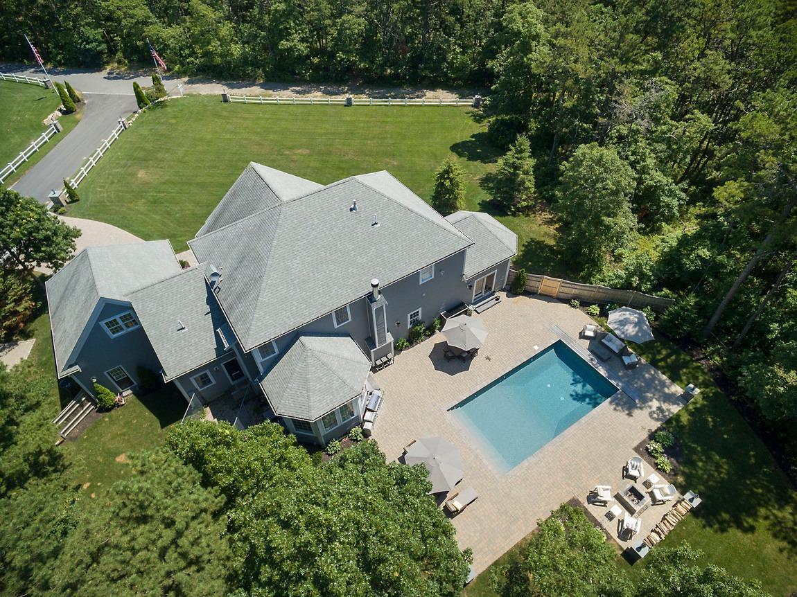 89 Old Hyannis Road Yarmouth Port, MA 02675 - Photo 28 of 35 an aerial view of a house with garden space and street view