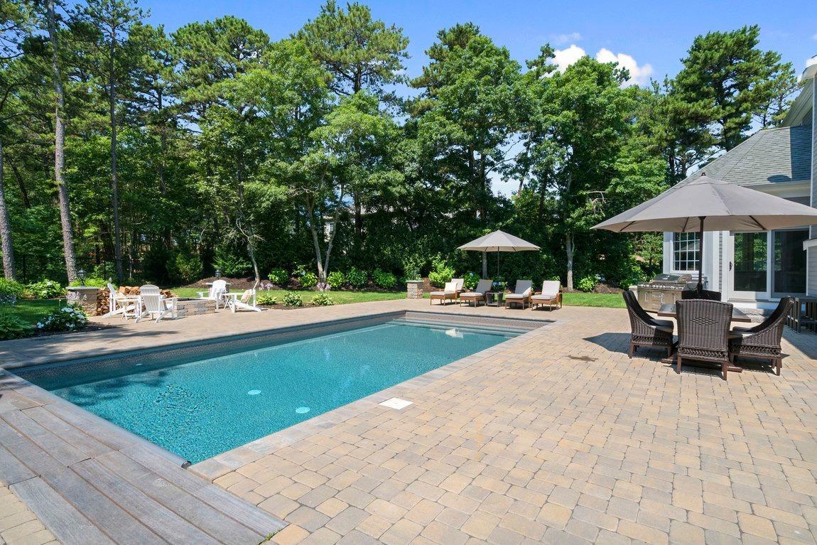 89 Old Hyannis Road Yarmouth Port, MA 02675 - Photo 3 of 35 a swimming pool view with a seating space