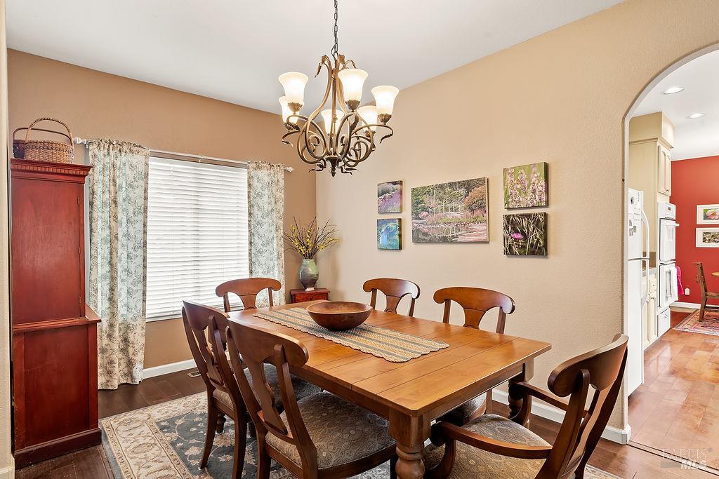 6252 Meadowstone Drive Santa Rosa, CA 95409 - Photo 20 of 33 a view of a dining room with furniture window and wooden floor