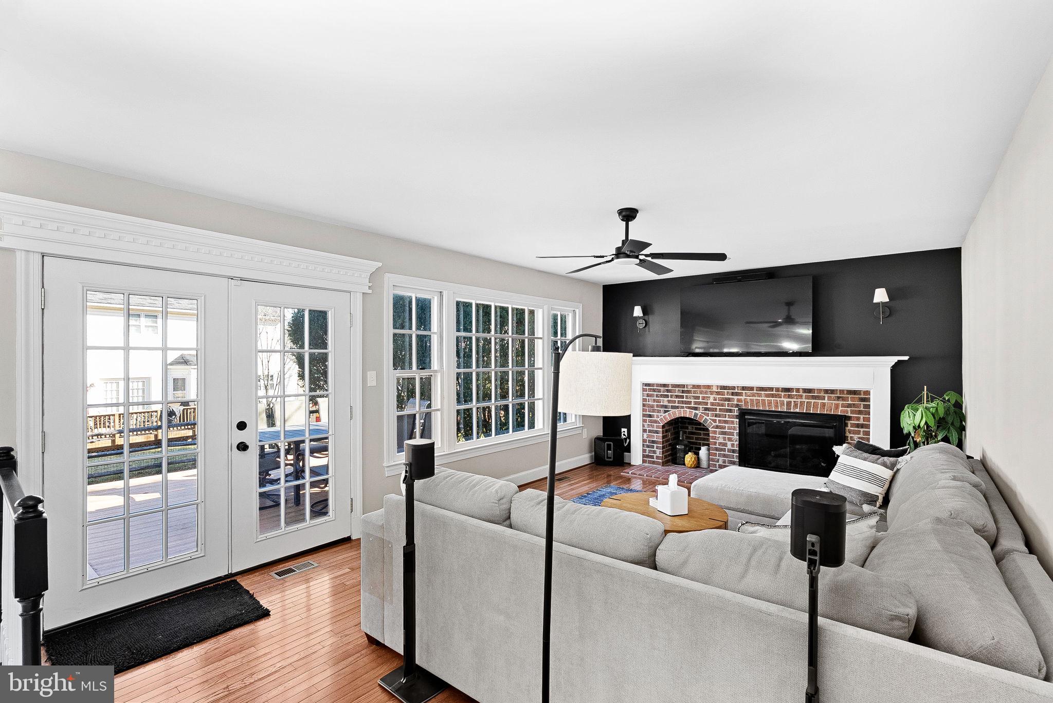 9440 Flowerden Lane Manassas, VA 20110 - Photo 19 of 66 a living room with furniture and a fireplace