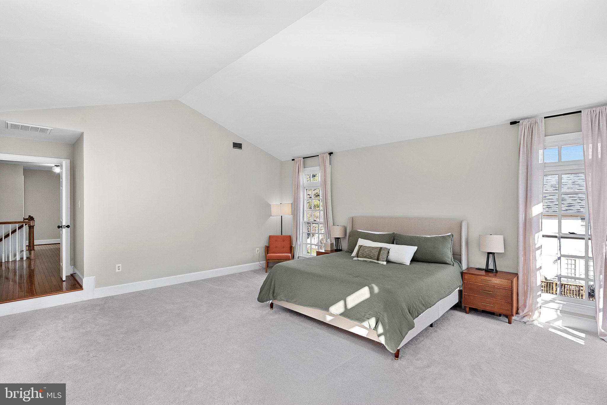 9440 Flowerden Lane Manassas, VA 20110 - Photo 29 of 66 a bed room with a bed and a couch